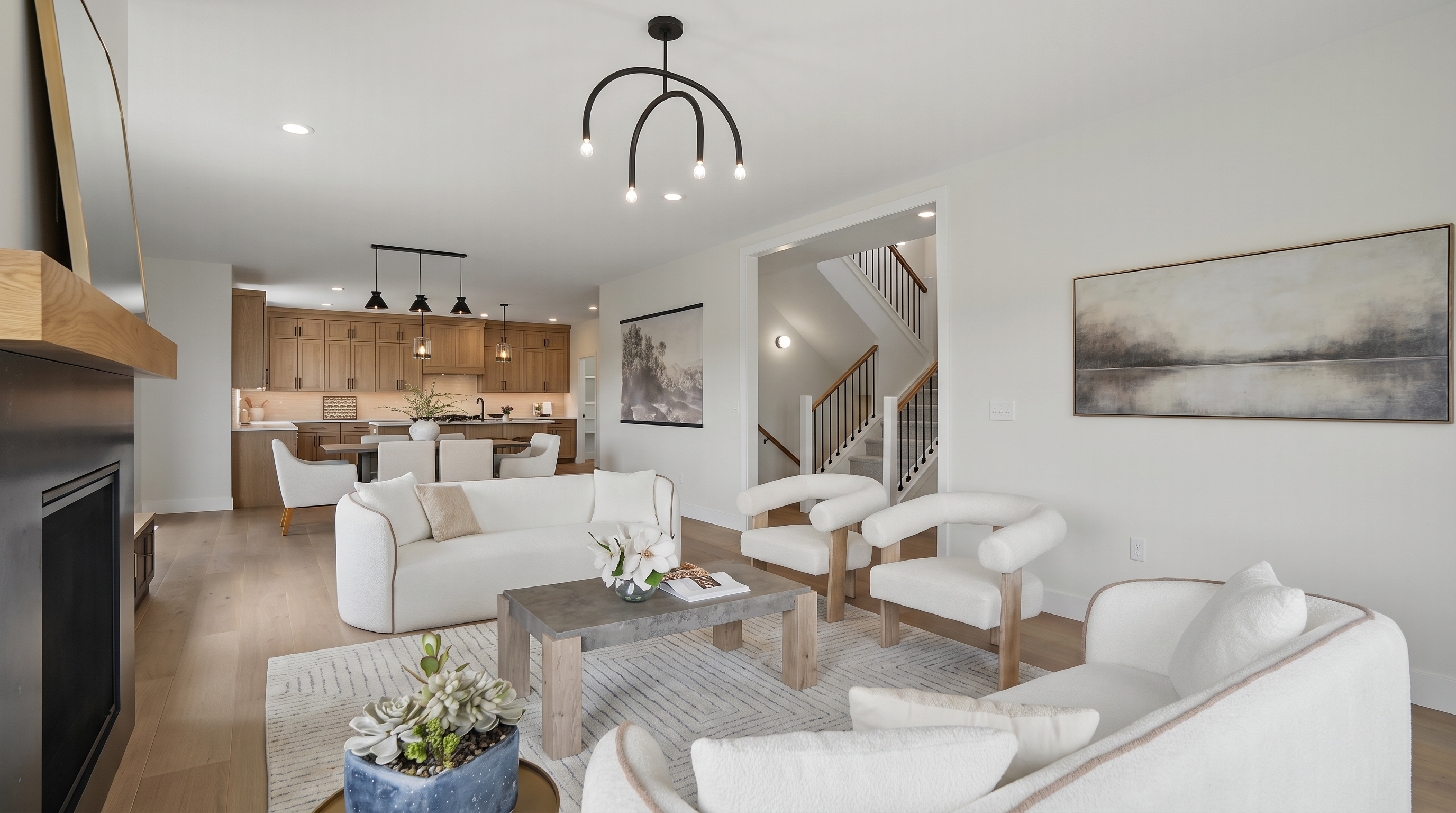 Bright modern living room with premium luxury vinyl plank flooring installed by EZ Floorz in the Iowa City area
